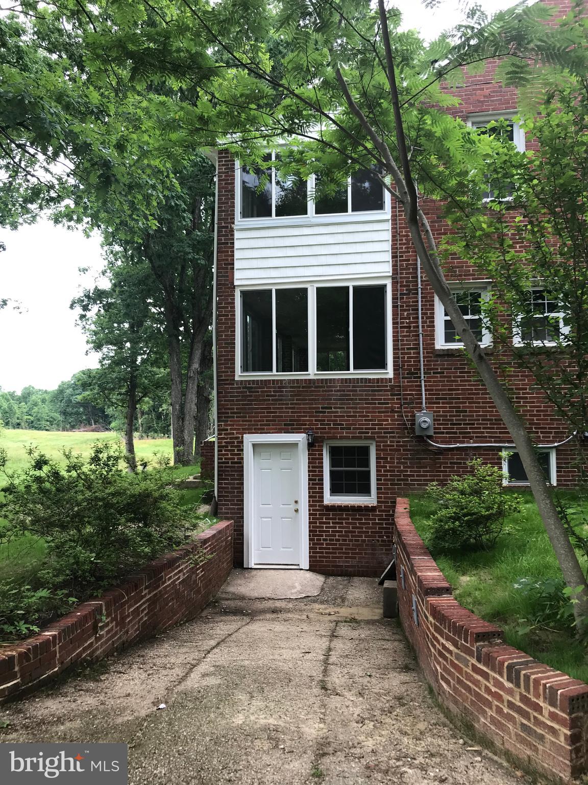 23615 Neck Road Aquasco, MD 20608 - Photo 5 of 70 side of home