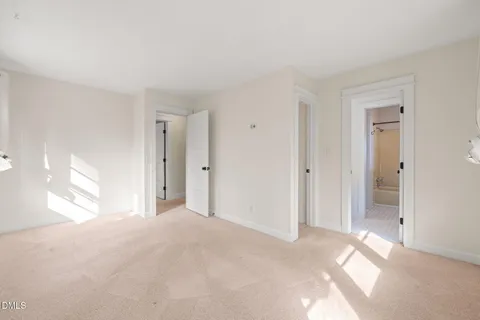 a view of empty room with windows