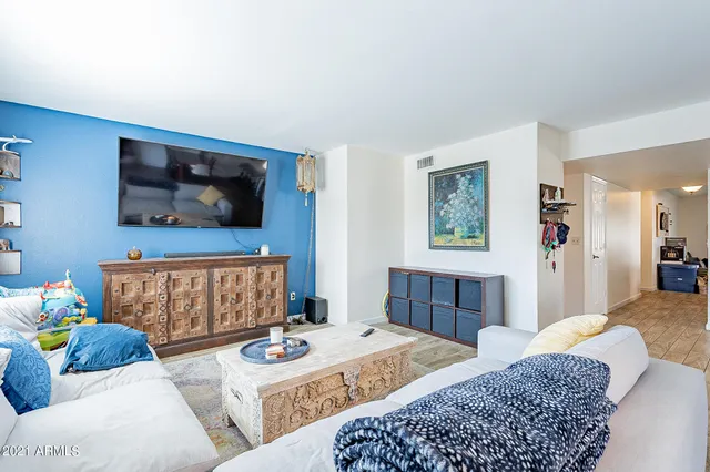 a kitchen with stainless steel appliances granite countertop a refrigerator stove and sink