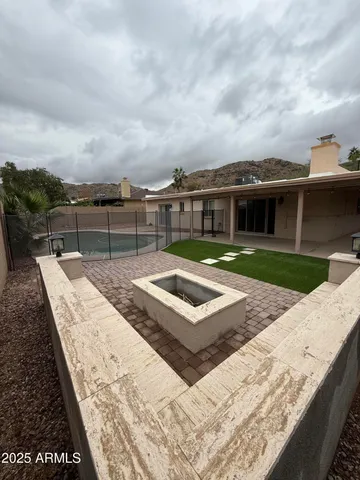 a view of outdoor space with swimming pool