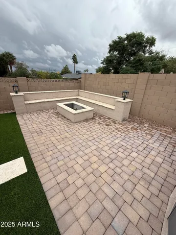 a view of a swimming pool with a balcony