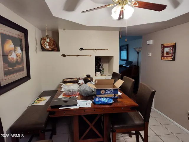 a view of a dining room with furniture