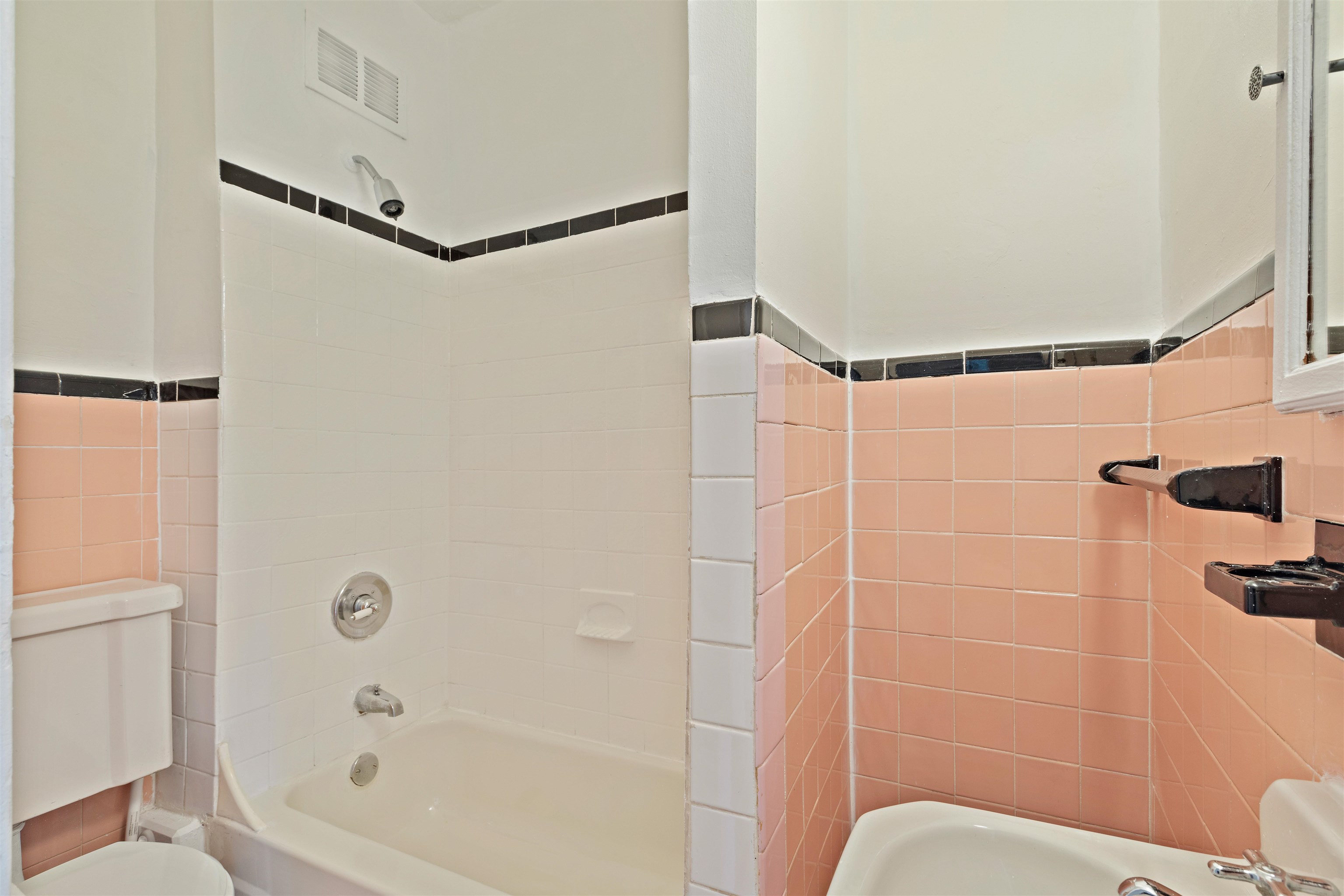 804 Bloomfield Street, Unit 2 Hoboken, NJ 07030 - Photo 12 of 14 a bathroom with a bathtub and a shower