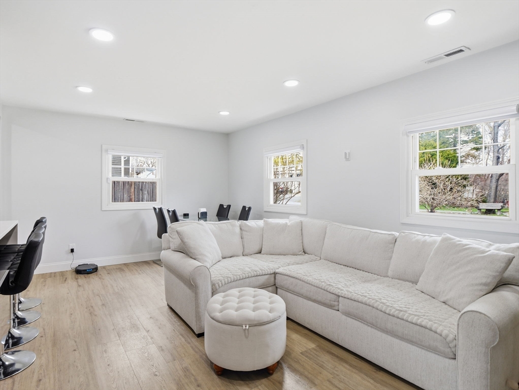63 Jasper Street Saugus, MA 01906 - Photo 13 of 39 a living room with furniture and a large window