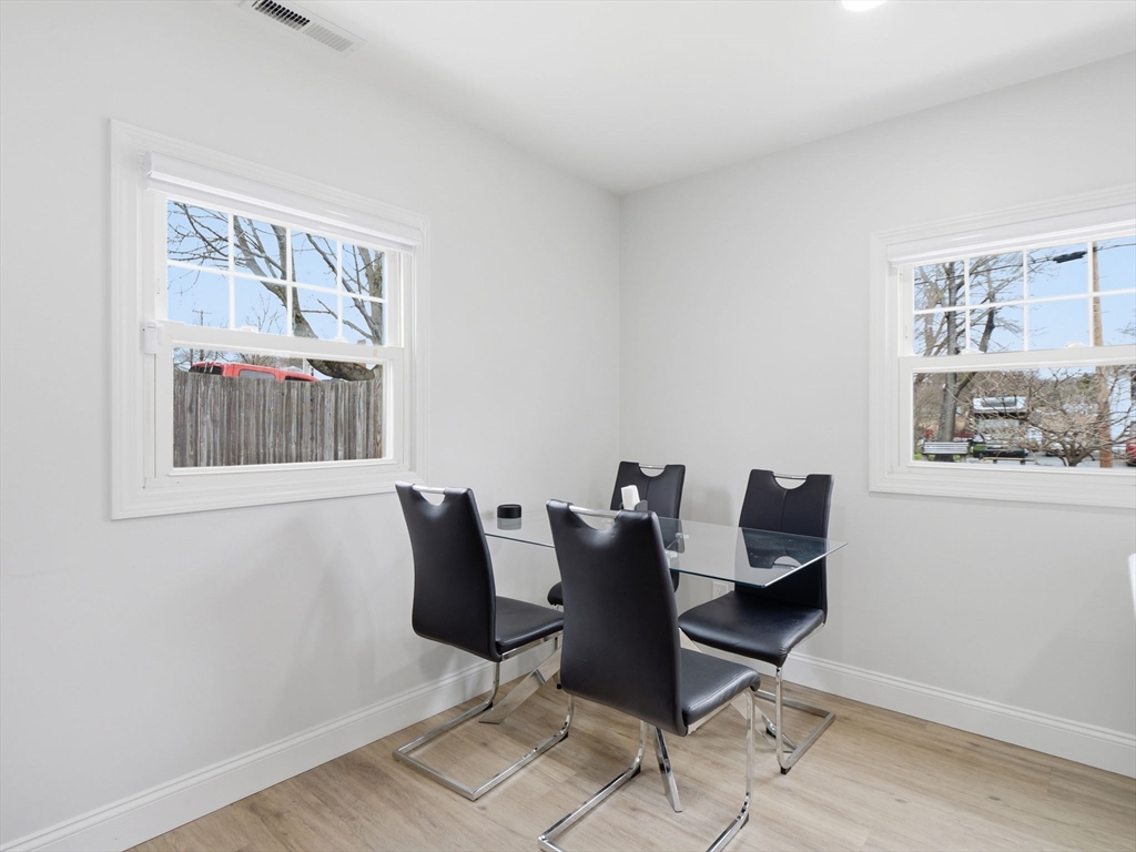 63 Jasper Street Saugus, MA 01906 - Photo 15 of 39 a view of a workspace with furniture and a window