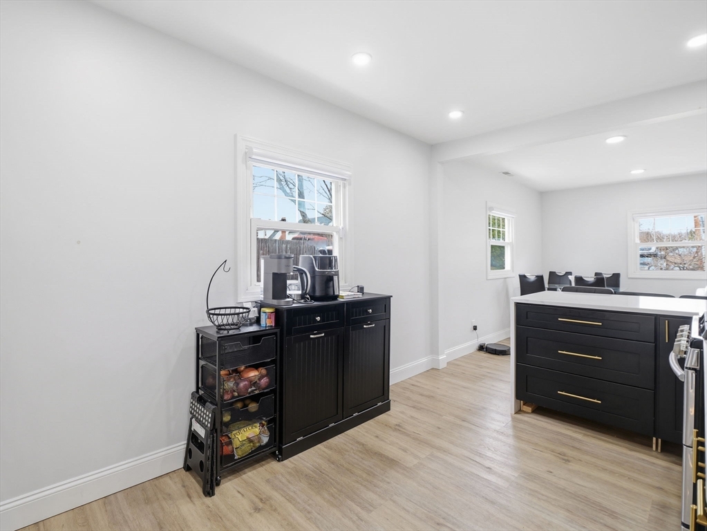 63 Jasper Street Saugus, MA 01906 - Photo 16 of 39 a room with a wooden floor and furniture