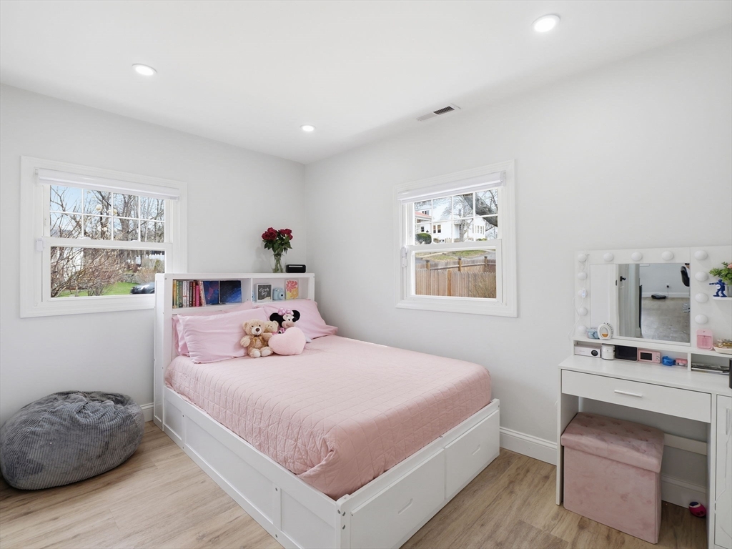 63 Jasper Street Saugus, MA 01906 - Photo 20 of 39 a bedroom with a bed and a window