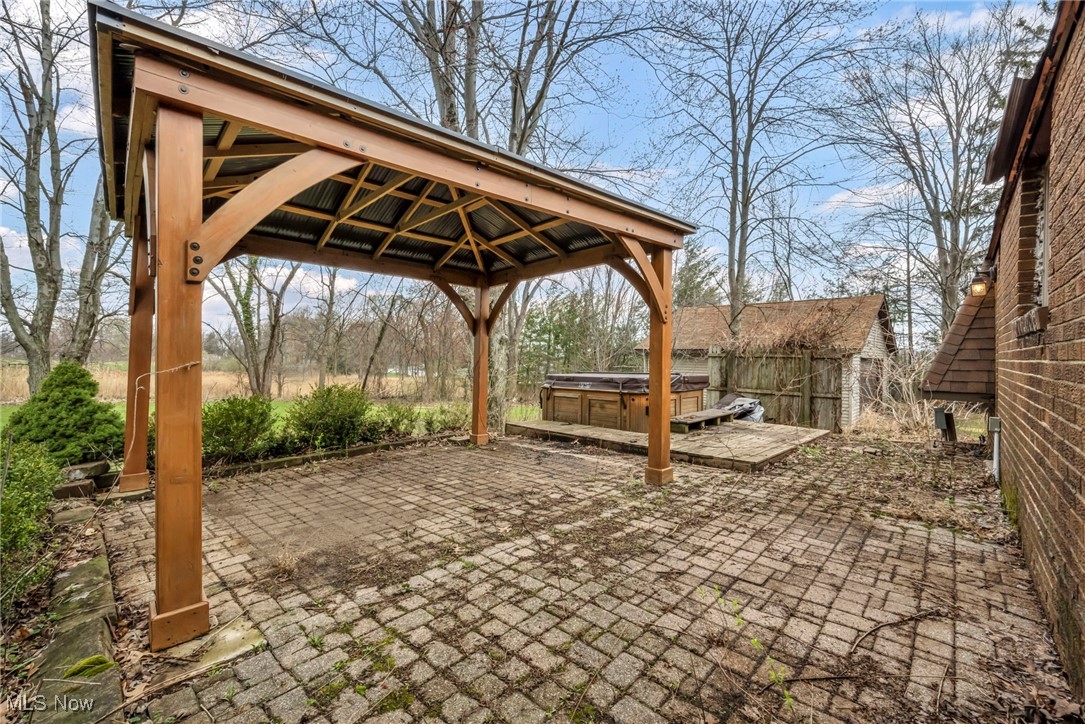 2680 Orchard Ext Road Wickliffe, OH 44092 - Photo 9 of 30 View of patio / terrace with a hot tub and a gazebo