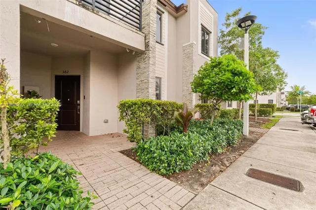 a view of a garden with pathway