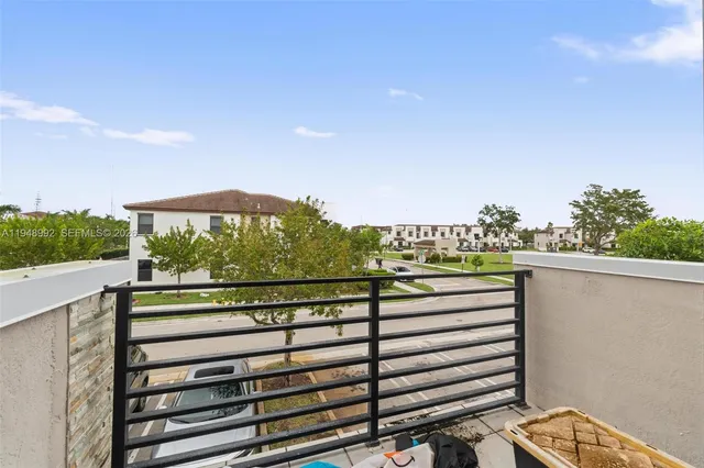 a view of a balcony with an outdoor space