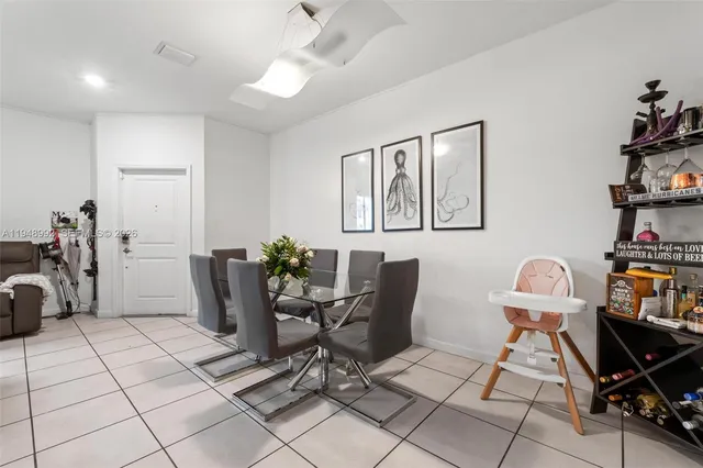 a view of a workspace with furniture