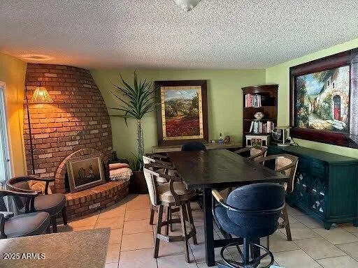 a view of a dining room with furniture and window