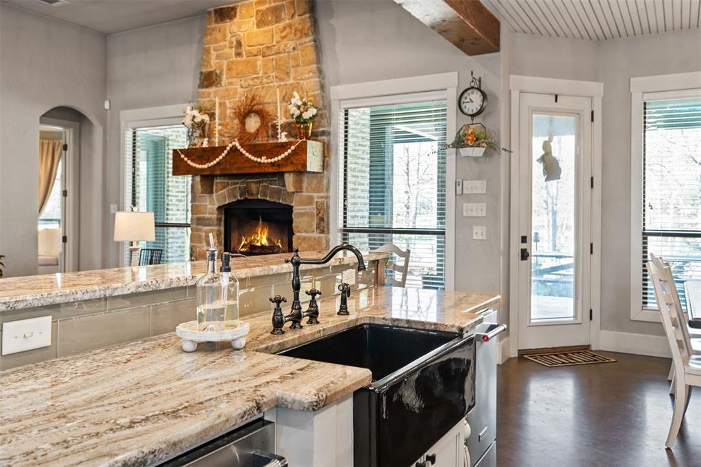 107 Nautical Point Mabank, TX 75143 - Photo 13 of 36 a kitchen with a stove and a sink
