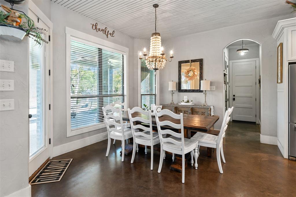 107 Nautical Point Mabank, TX 75143 - Photo 15 of 36 a view of a dining room with furniture window and wooden floor