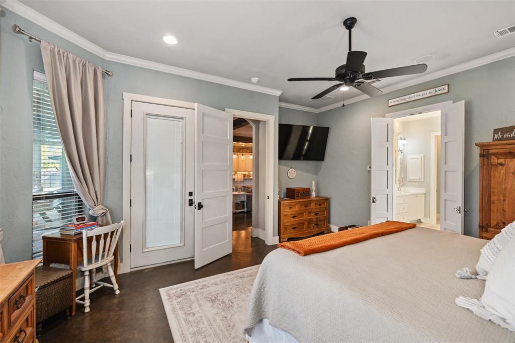 107 Nautical Point Mabank, TX 75143 - Photo 17 of 36 a bedroom with a bed dresser and a window