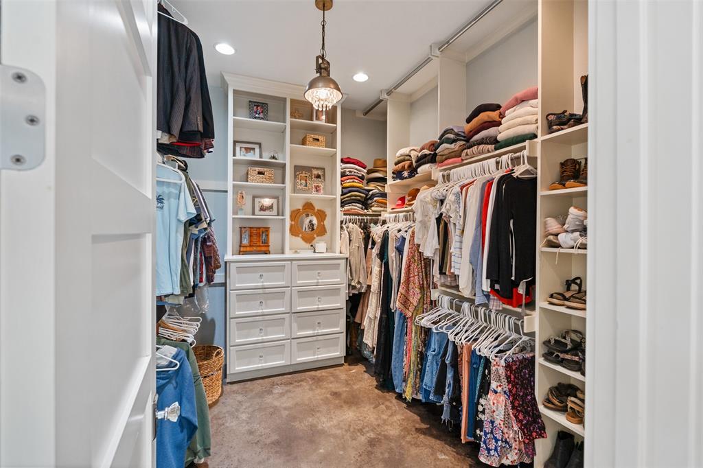 107 Nautical Point Mabank, TX 75143 - Photo 20 of 36 a view of walk in closet with clothes and shoes