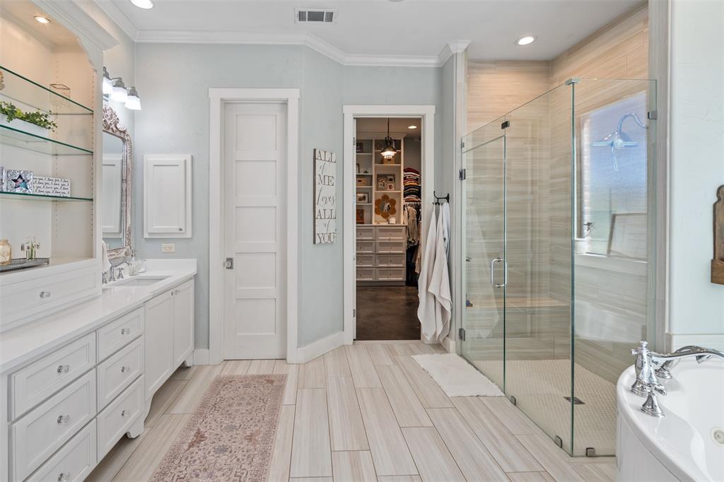 107 Nautical Point Mabank, TX 75143 - Photo 21 of 36 a bathroom with a sink and a shower