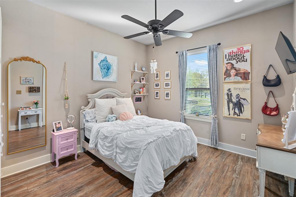 107 Nautical Point Mabank, TX 75143 - Photo 24 of 36 a bedroom with a bed and a window