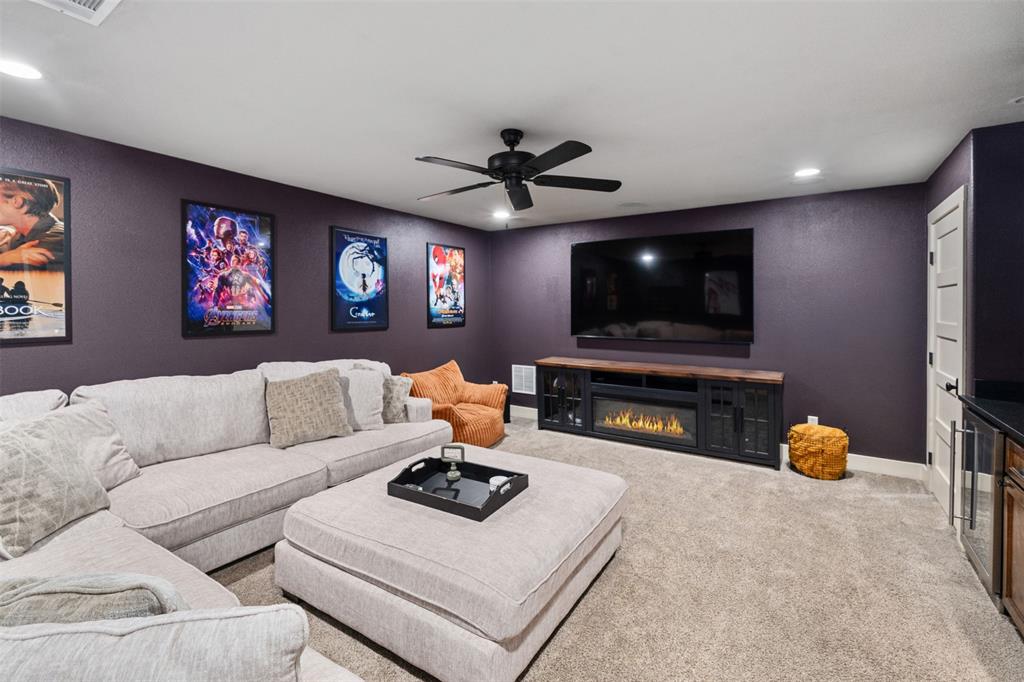 107 Nautical Point Mabank, TX 75143 - Photo 27 of 36 a living room with furniture and a flat screen tv