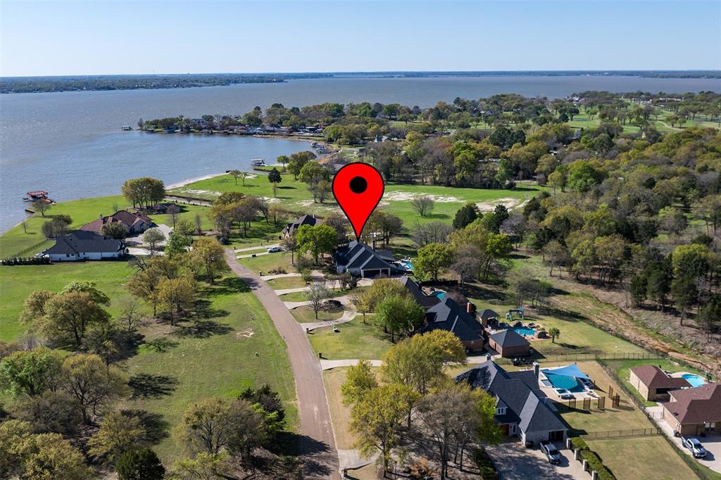 107 Nautical Point Mabank, TX 75143 - Photo 36 of 36 an aerial view of a house with a pool and outdoor space