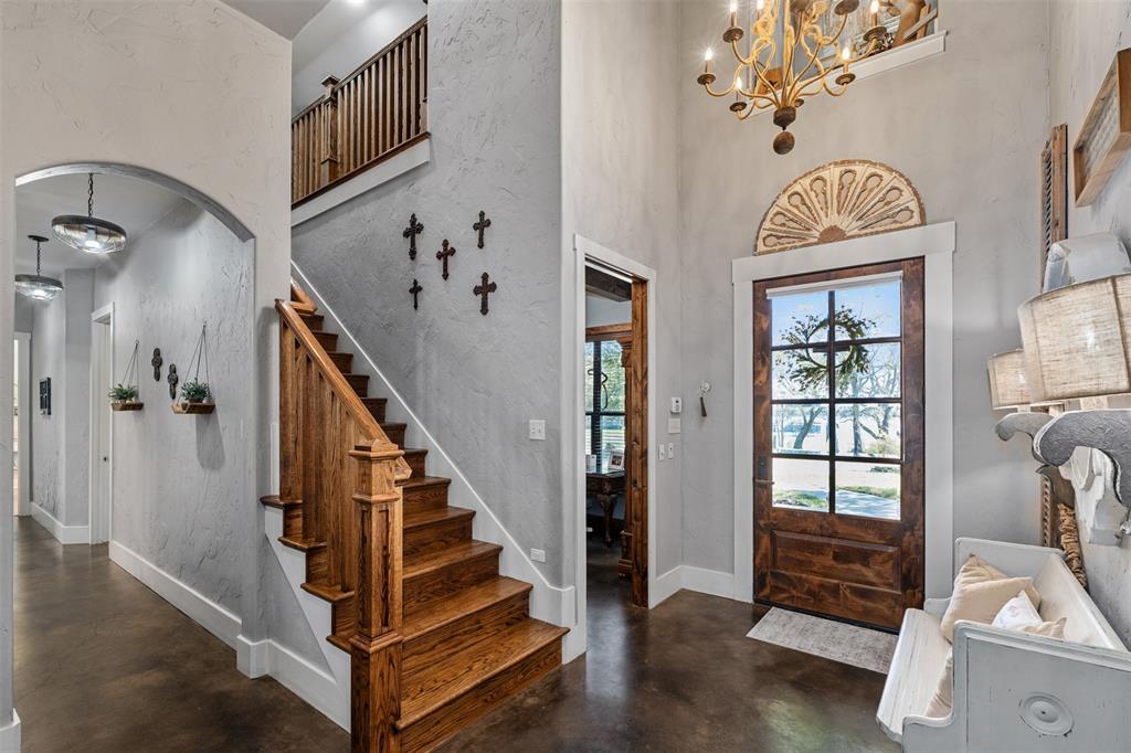 107 Nautical Point Mabank, TX 75143 - Photo 5 of 36 a view of entryway with wooden floor and windows