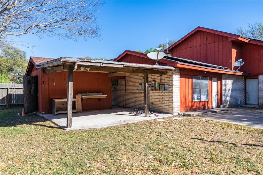 2217 Post Oak Drive Portland, TX 78374 - Photo 37 of 39 a front view of a house with a yard