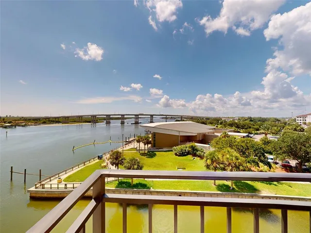 a view of a lake from a balcony