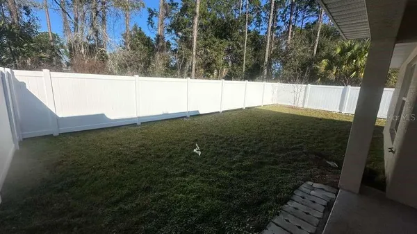 a view of outdoor space and yard