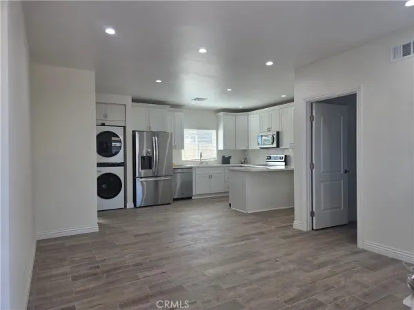 a bathroom with a sink toilet and vanity