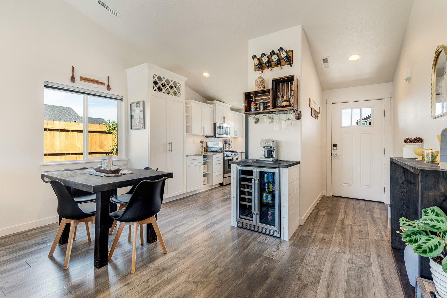3499 Northwest 9th Lane Redmond, OR 97756 - Photo 11 of 29 Dining area with stainless wine fridge