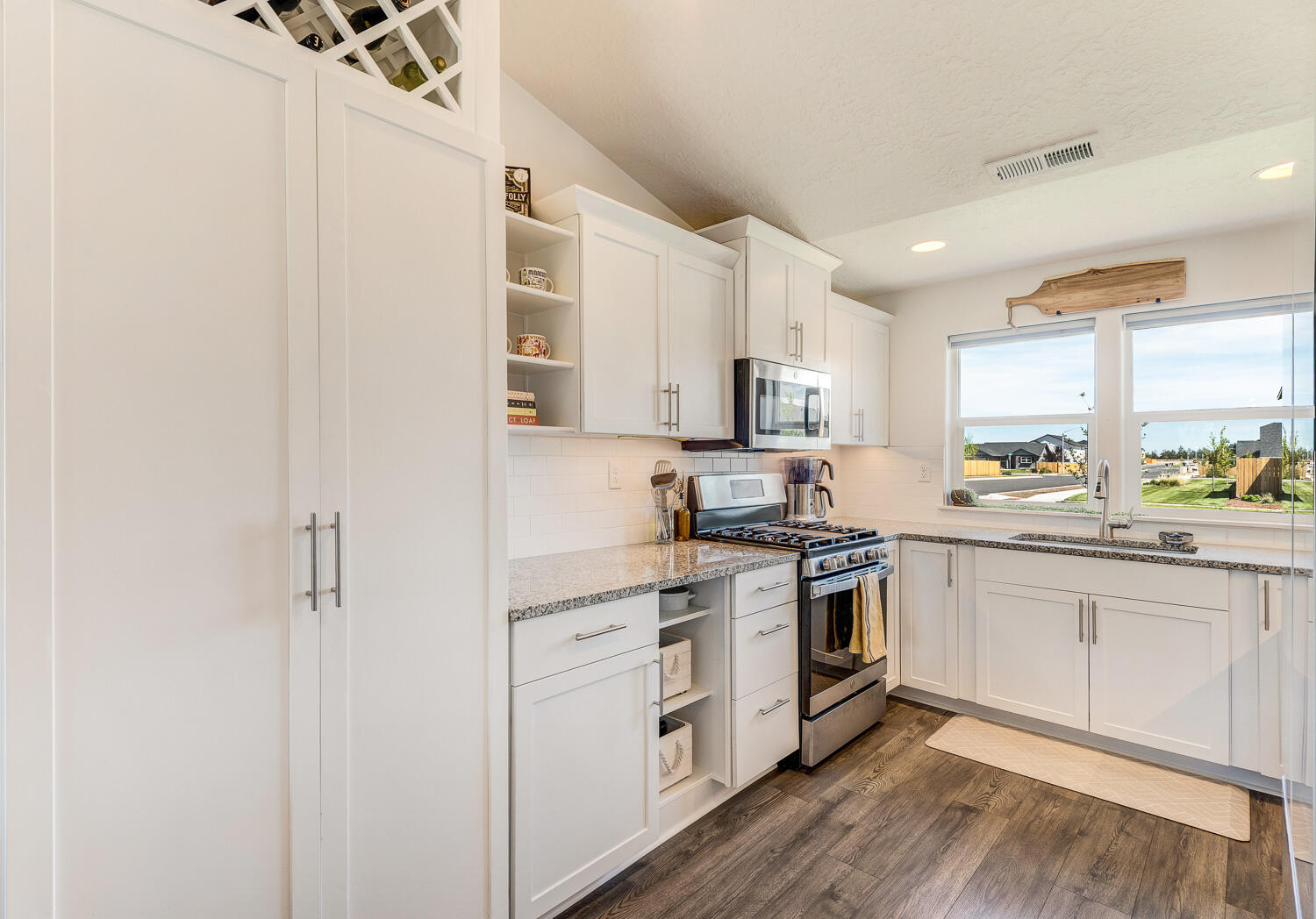 3499 Northwest 9th Lane Redmond, OR 97756 - Photo 10 of 29 Kitchen with pantry & stainless steel appliances