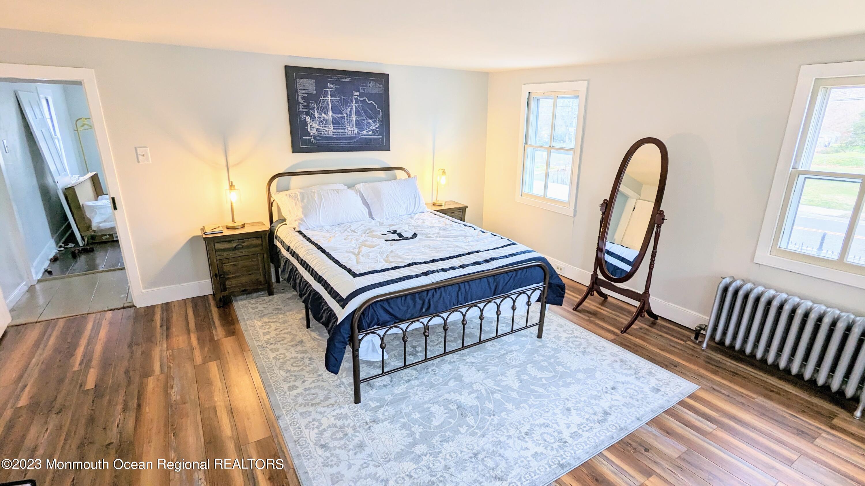 303 Baptist Road Newport, NJ 08345 - Photo 11 of 20 a bedroom with a bed next to a window