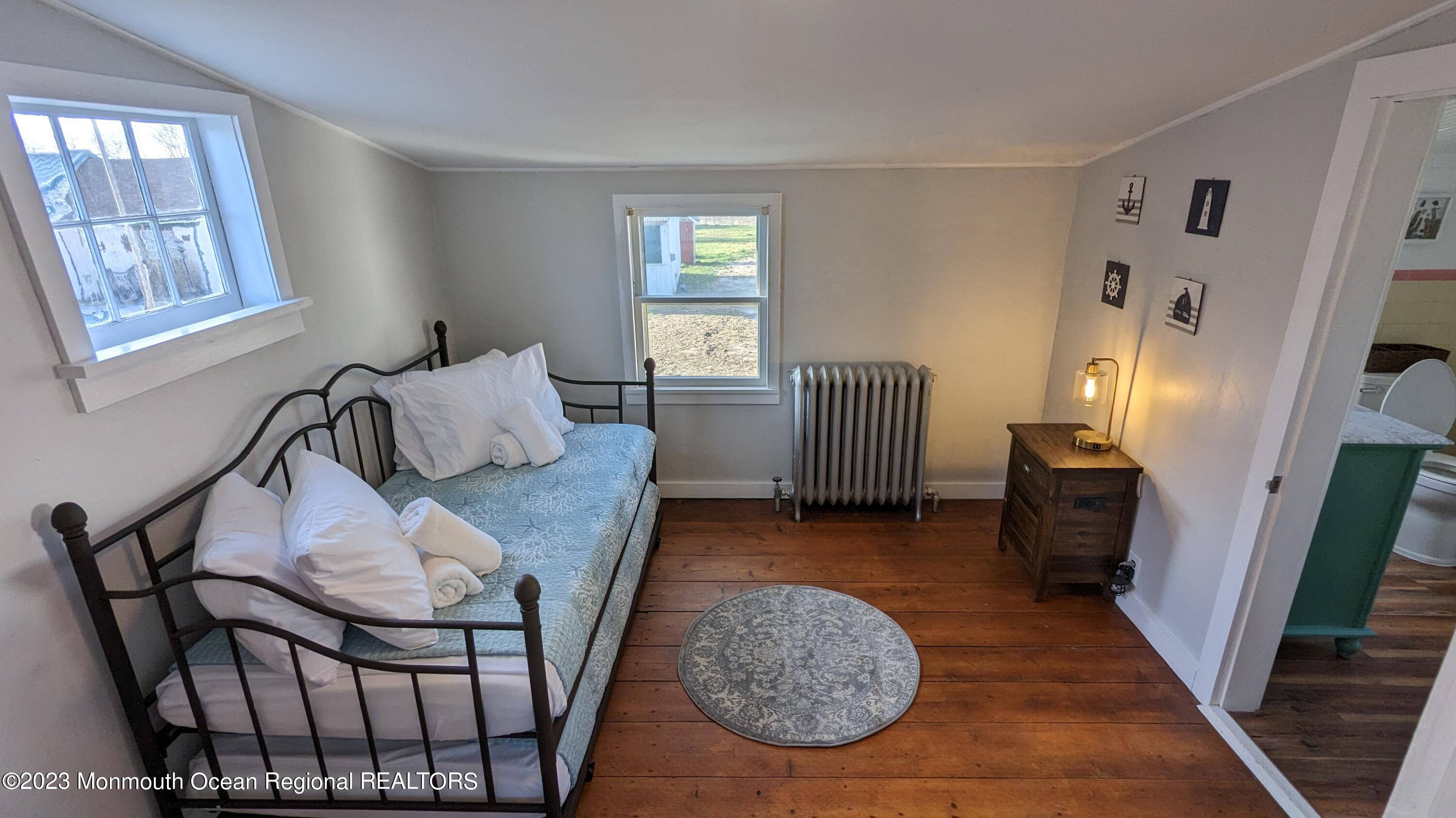 303 Baptist Road Newport, NJ 08345 - Photo 12 of 20 a living room with furniture and a window