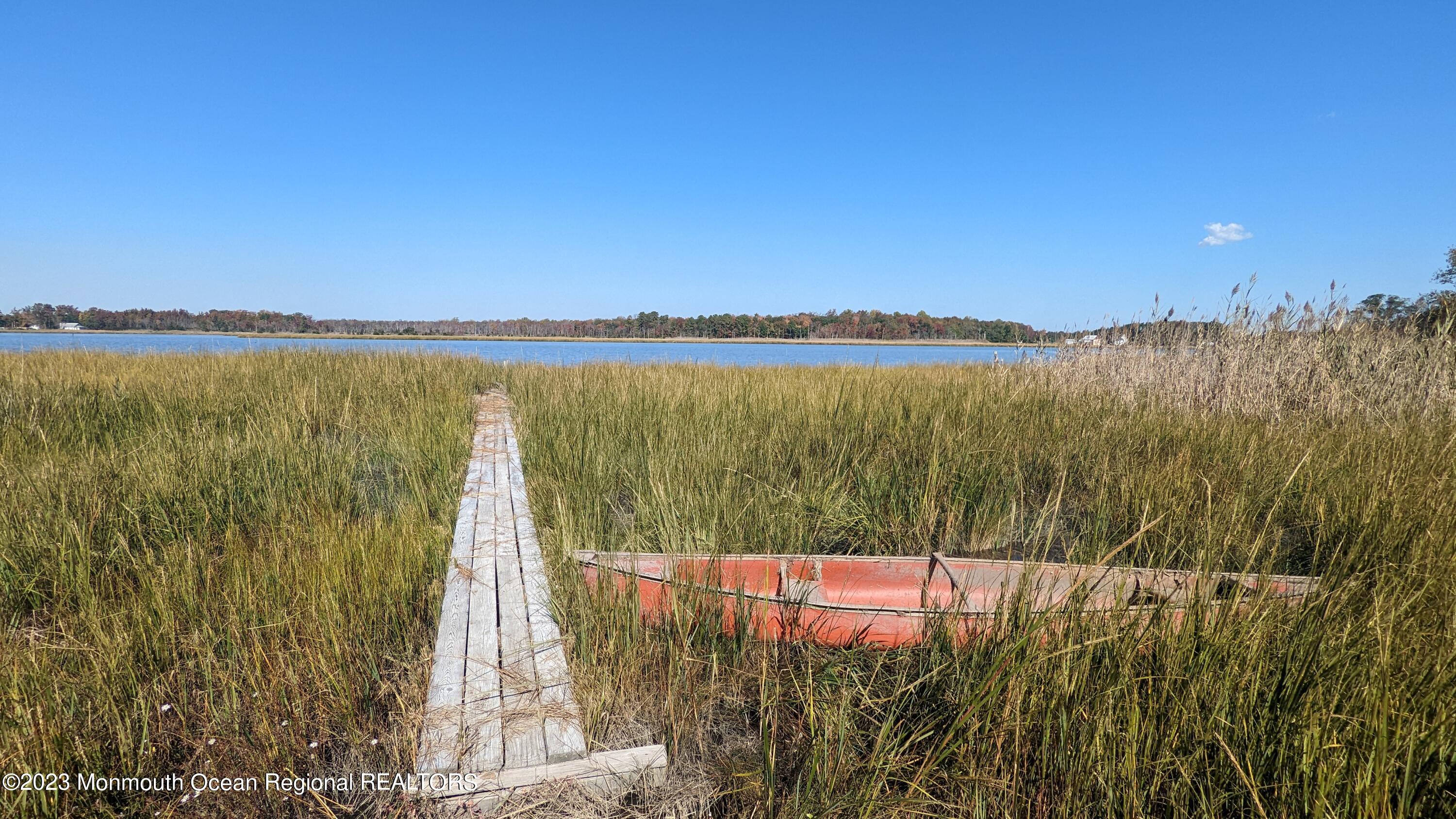 303 Baptist Road Newport, NJ 08345 - Photo 19 of 20 a view of a lake and a mountain view