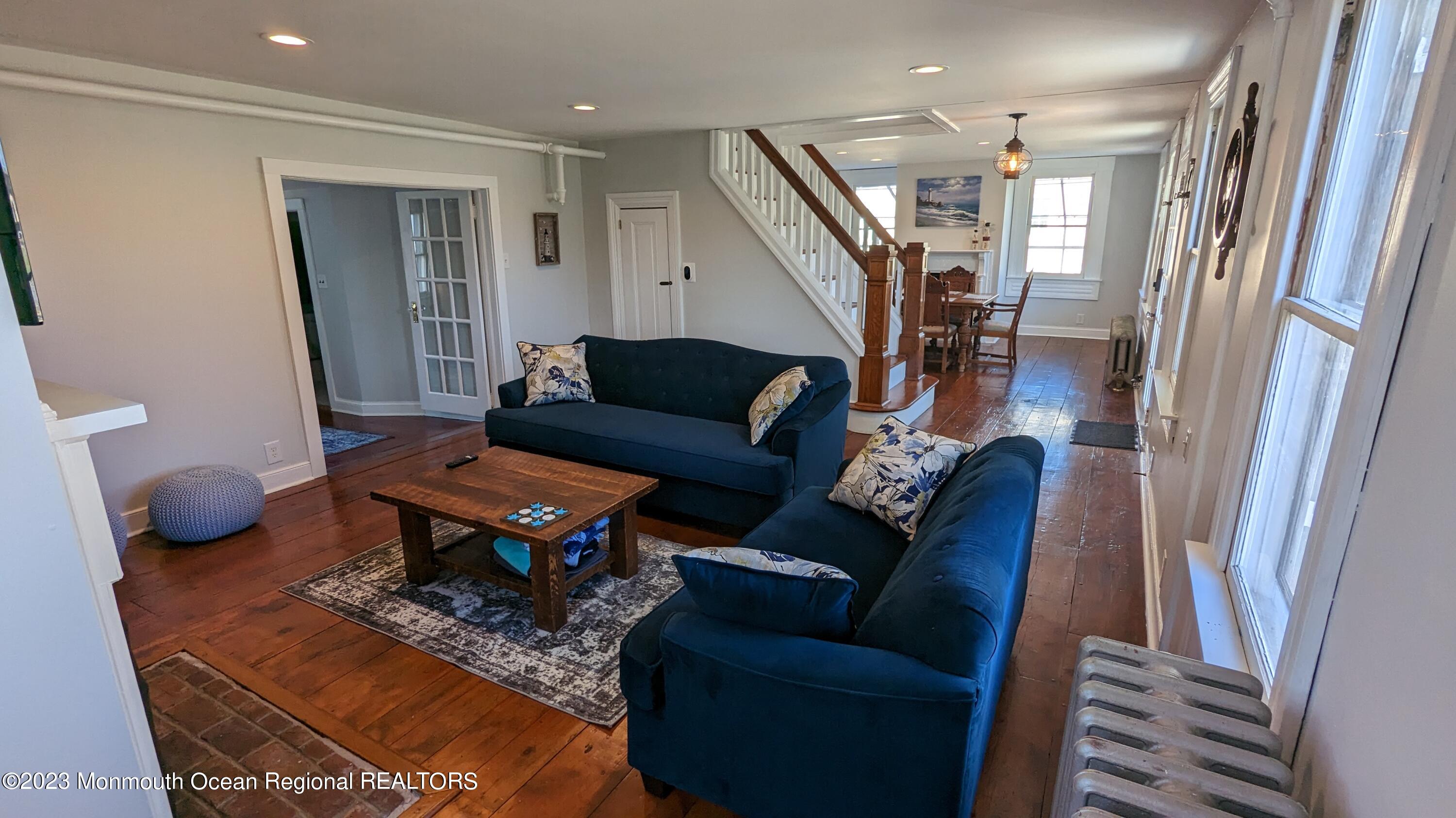 303 Baptist Road Newport, NJ 08345 - Photo 4 of 20 a living room with furniture and a rug