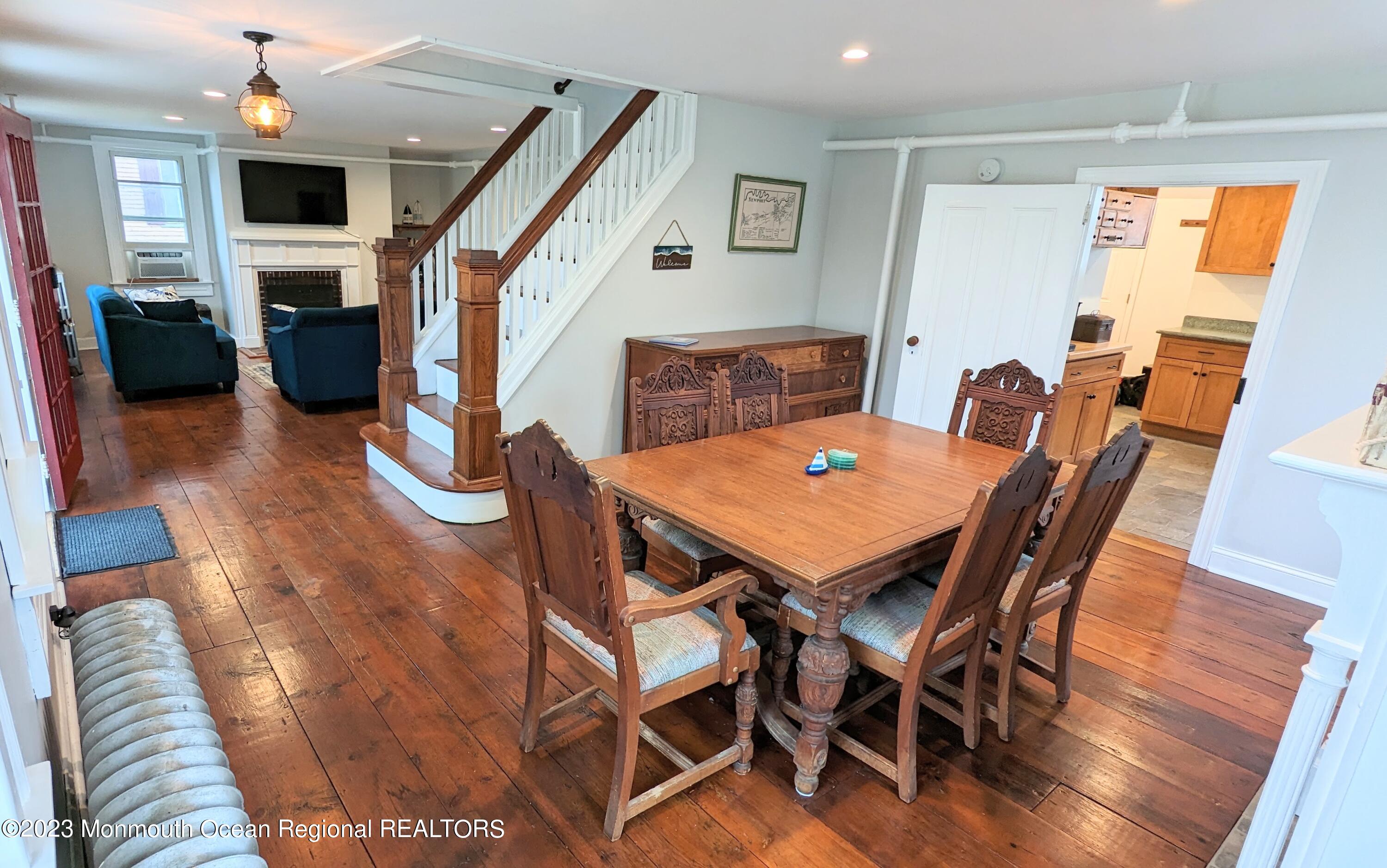 303 Baptist Road Newport, NJ 08345 - Photo 7 of 20 a view of a dining room with furniture and wooden floor