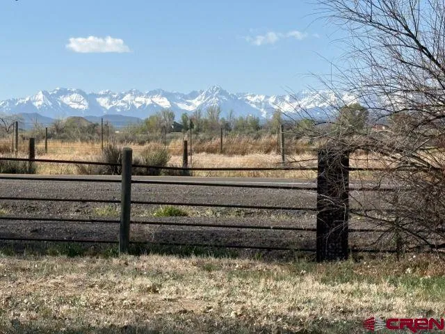 a view of a bench in front of house