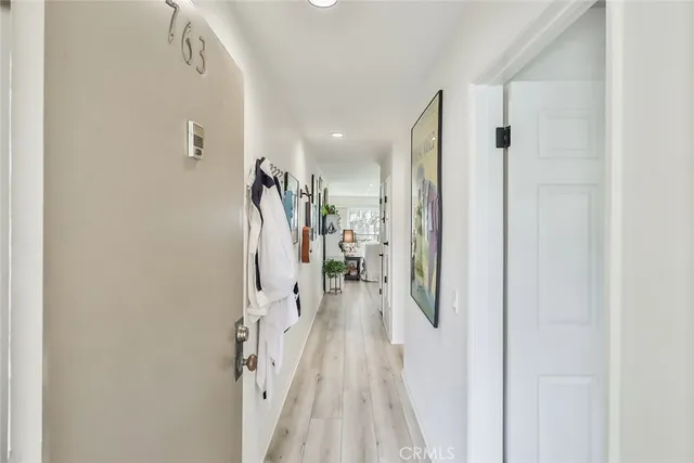 a view of entryway with wooden floor