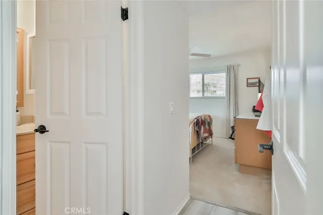 a bedroom with a bed and a cabinets