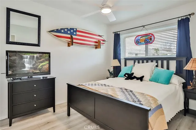a view of a hallway with furniture and window