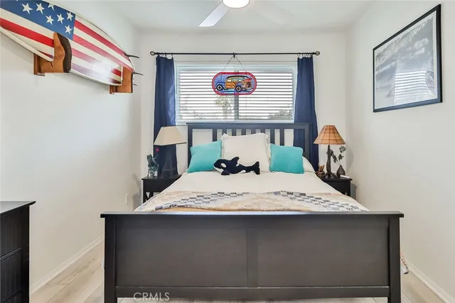 a bedroom with a bed and a cabinets
