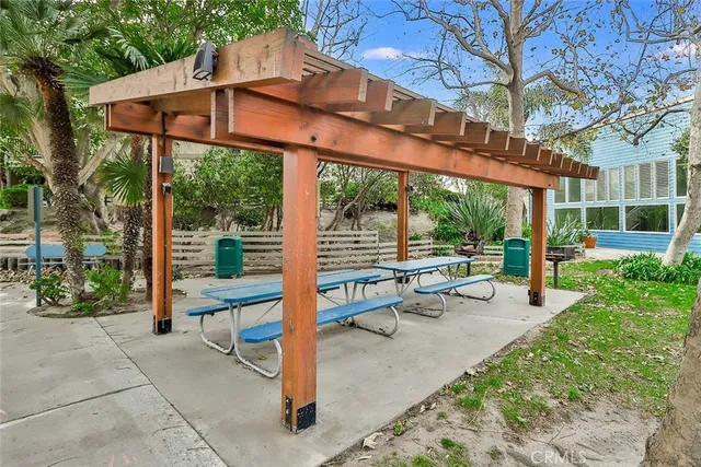 a view of a park with a large tree