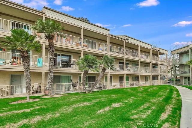 a view of a garden with an ocean view