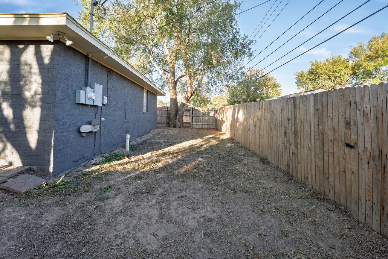 2607 15th Avenue Canyon, TX 79015 - Photo 13 of 54 a backyard of a house