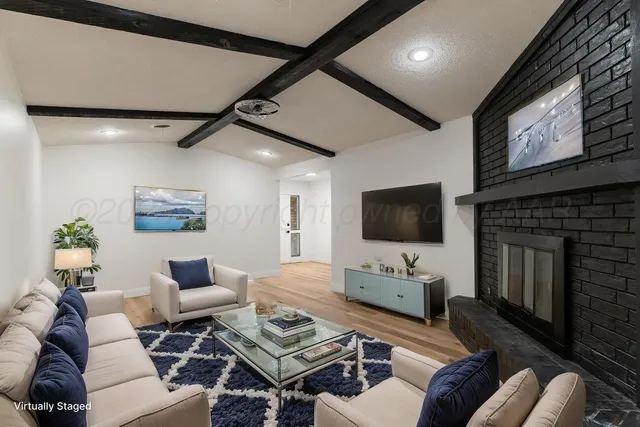 a view of a kitchen with electric appliances