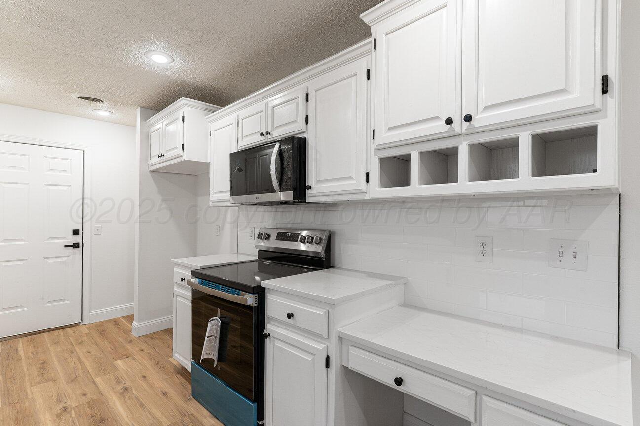 2607 15th Avenue Canyon, TX 79015 - Photo 21 of 54 a view of a kitchen with electric appliances