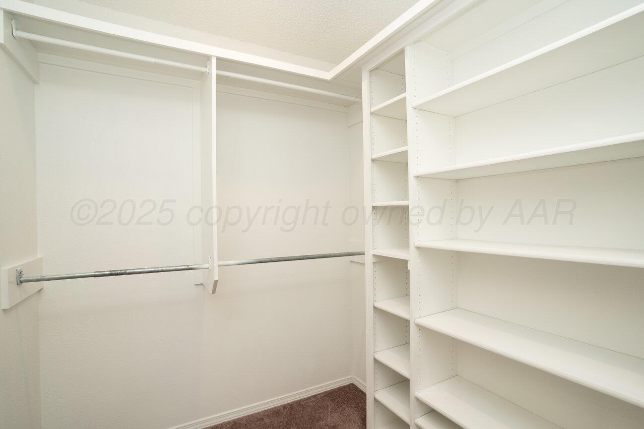2607 15th Avenue Canyon, TX 79015 - Photo 37 of 54 a view of an empty walk in closet