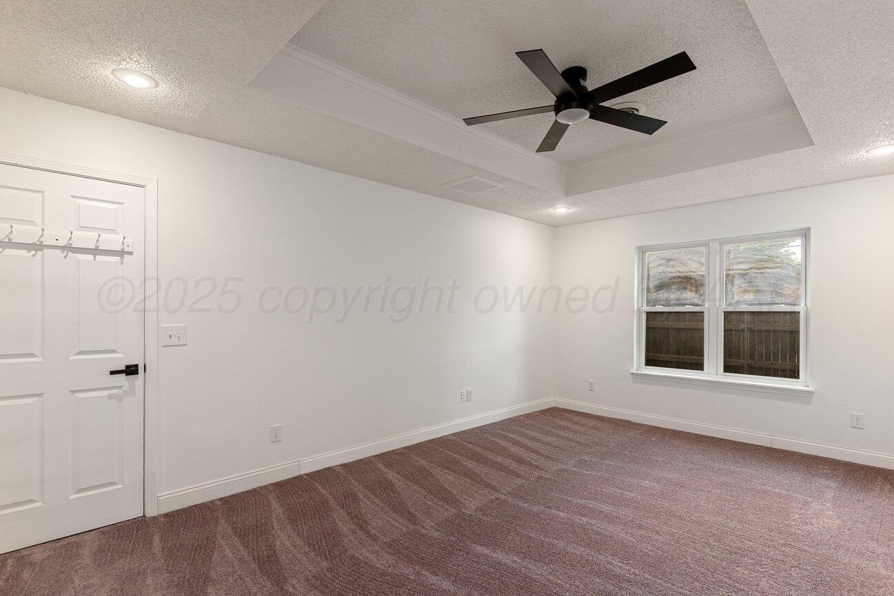 2607 15th Avenue Canyon, TX 79015 - Photo 42 of 54 wooden floor in an empty room with a window
