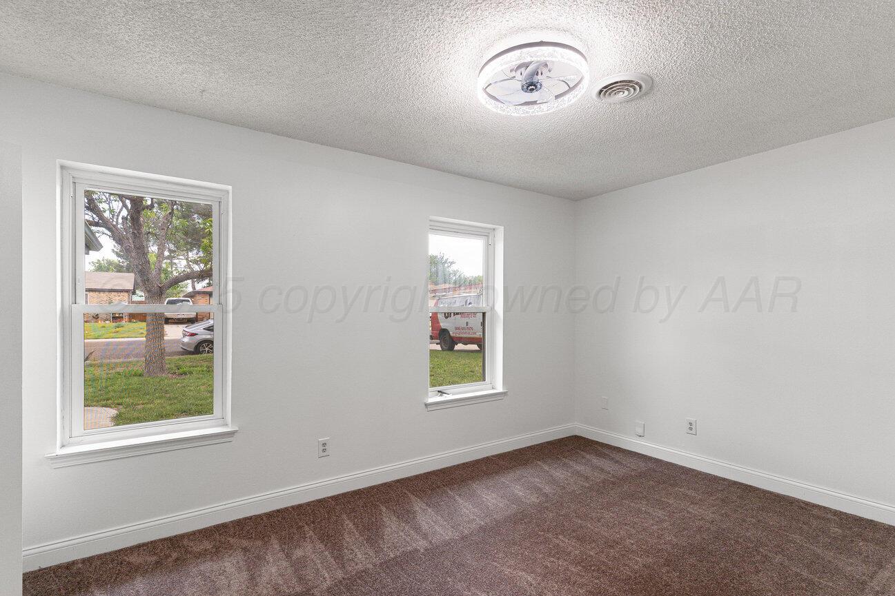 2607 15th Avenue Canyon, TX 79015 - Photo 49 of 54 an empty room with a window