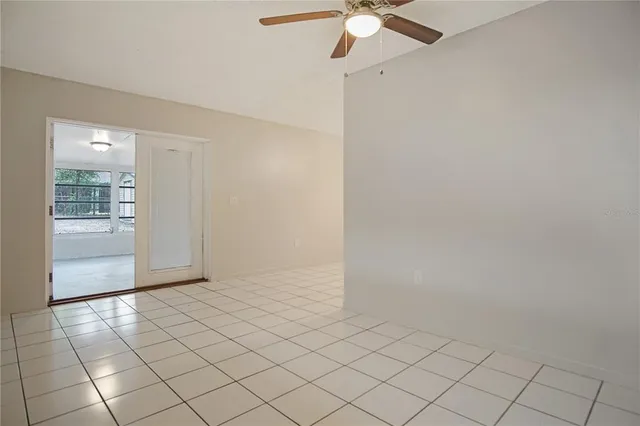 an empty room with fan